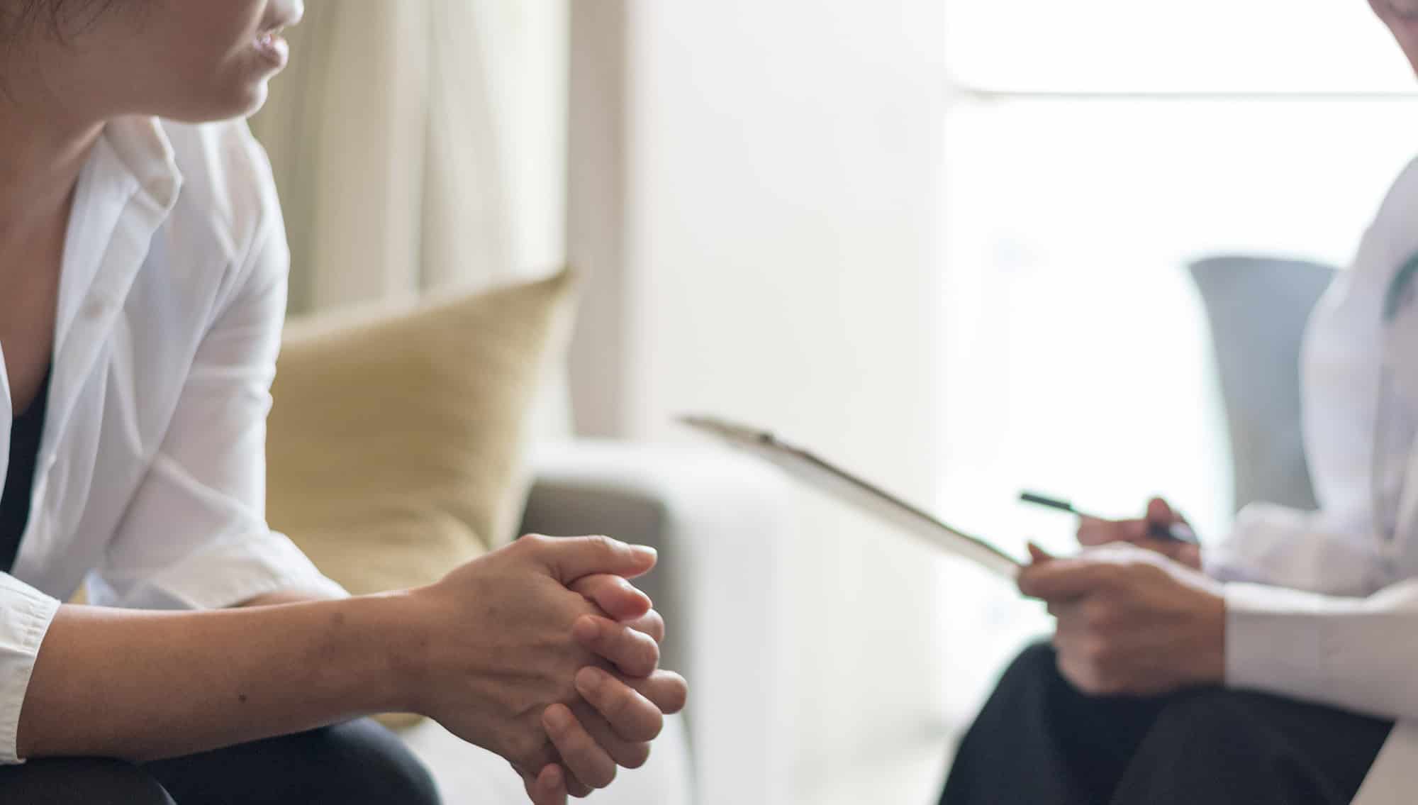 general practitioner having a meeting with patient